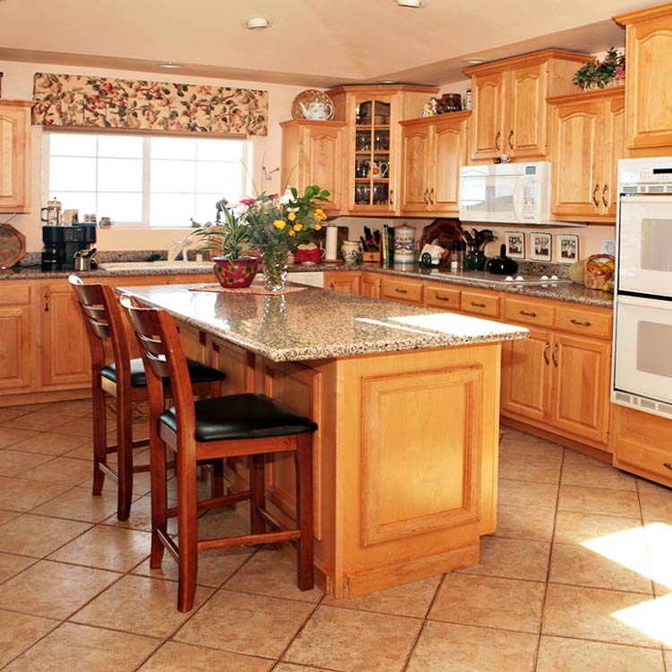 kitchens -  light oak wood cabinets and granite countertops
