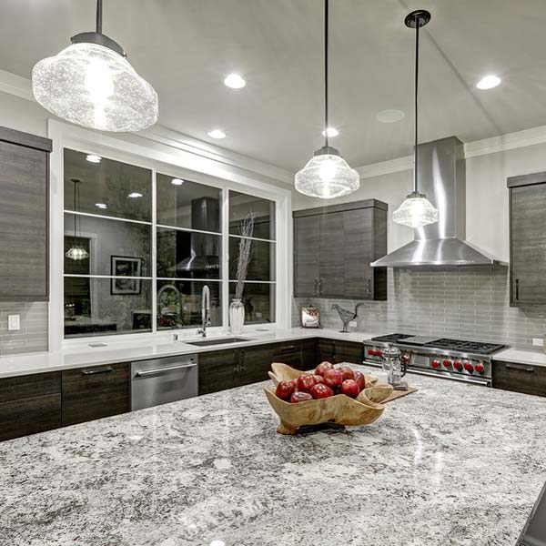 kitchens - Gray and white kitchen with dark wood accents and a basket of apples to add accent color
