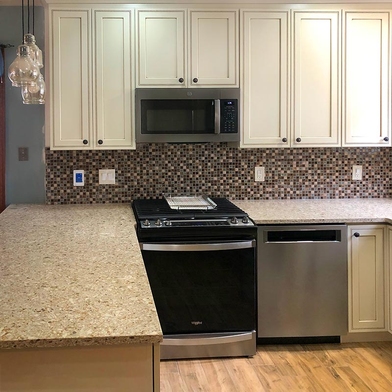 kitchens design - off-white countertops and mosaic tile backsplash